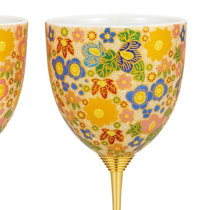 Pair of wine cups, flower arrangement